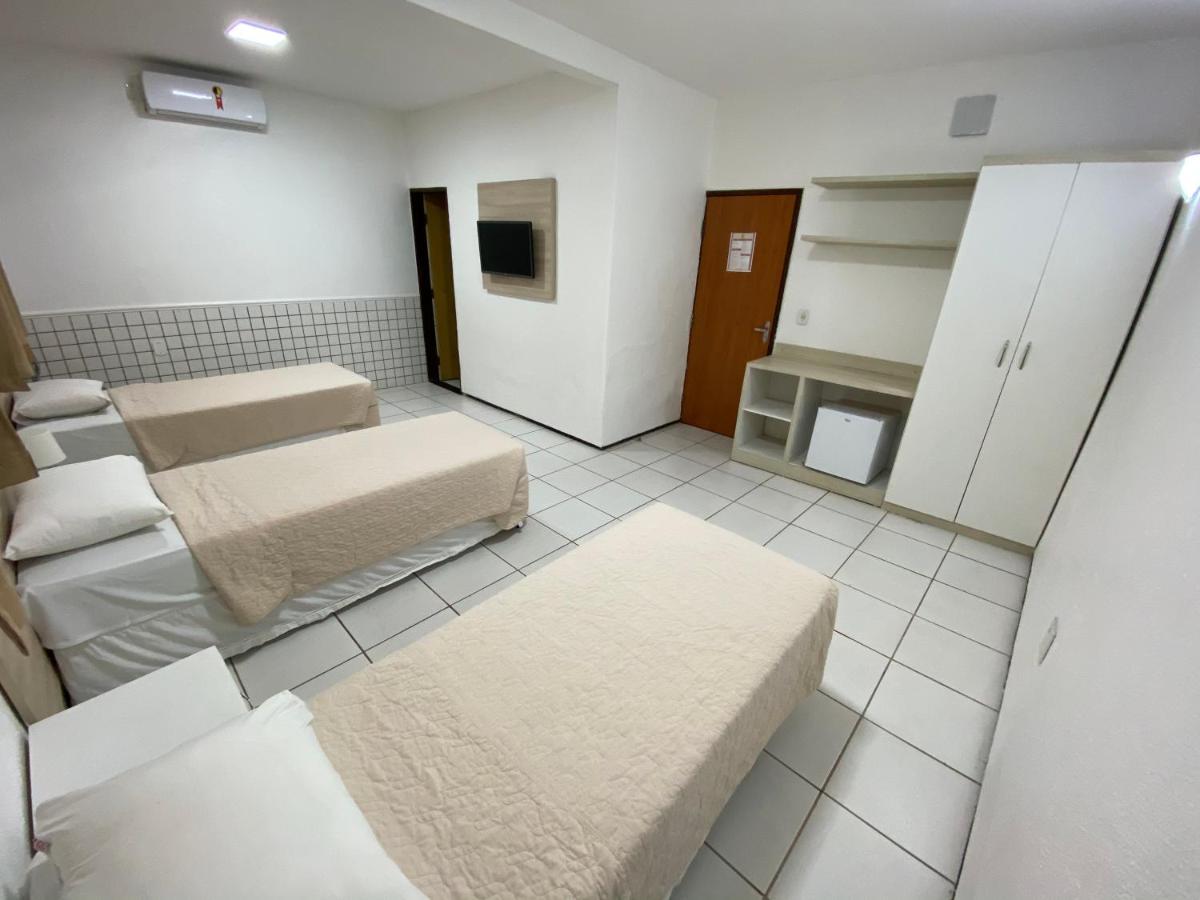 Quarto Triplo Executivo