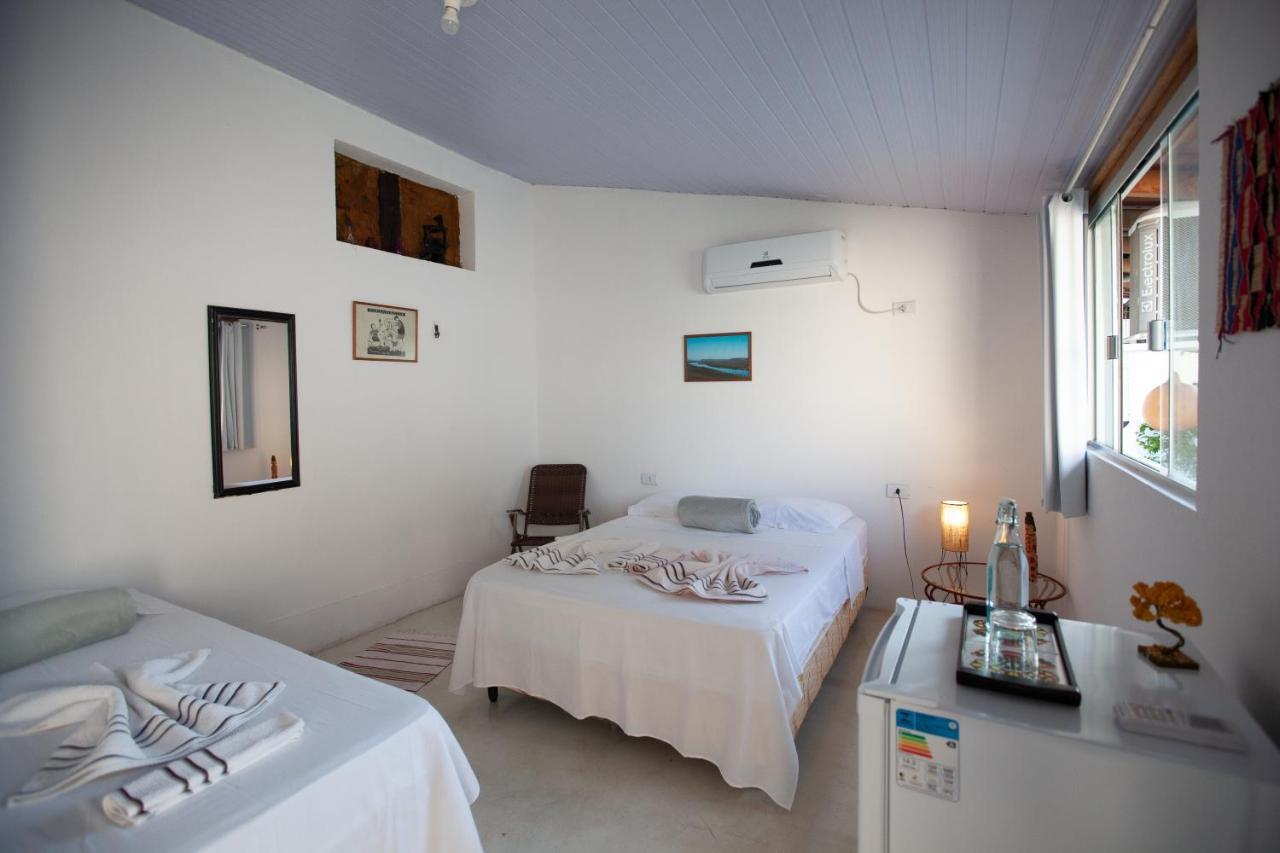 Quarto Triplo com Vista para a Piscina