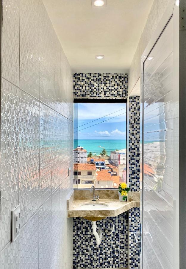 Quarto Triplo Deluxe com Vista do Mar