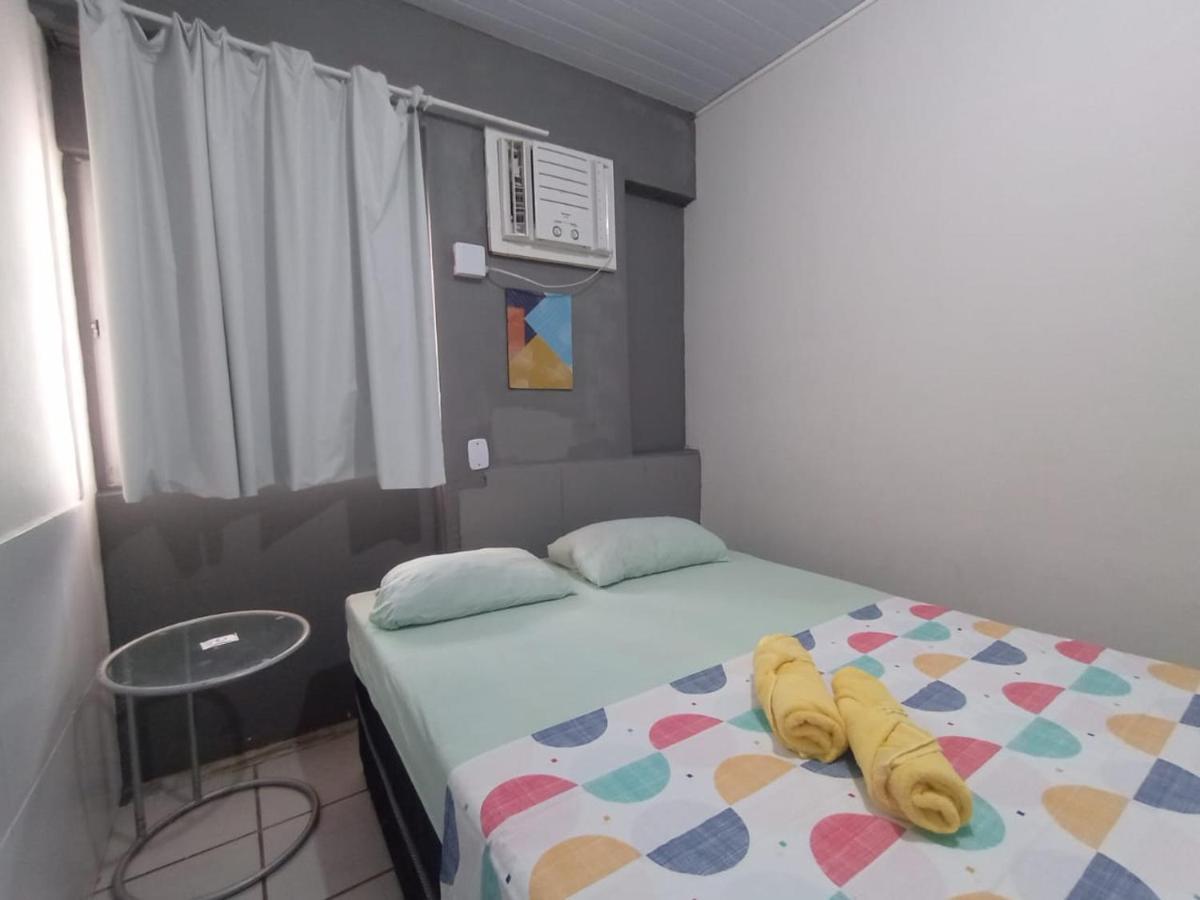 Quarto com Cama de Casal ou 2 de Solteiro e Banheiro Compartilhado