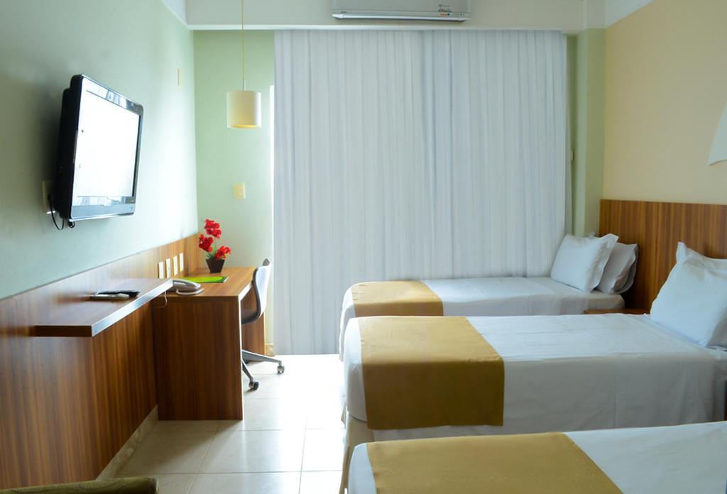 Quarto Triplo com Vista do Mar