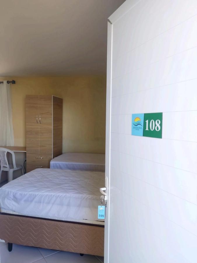Quarto Quádruplo com Vista do Mar.