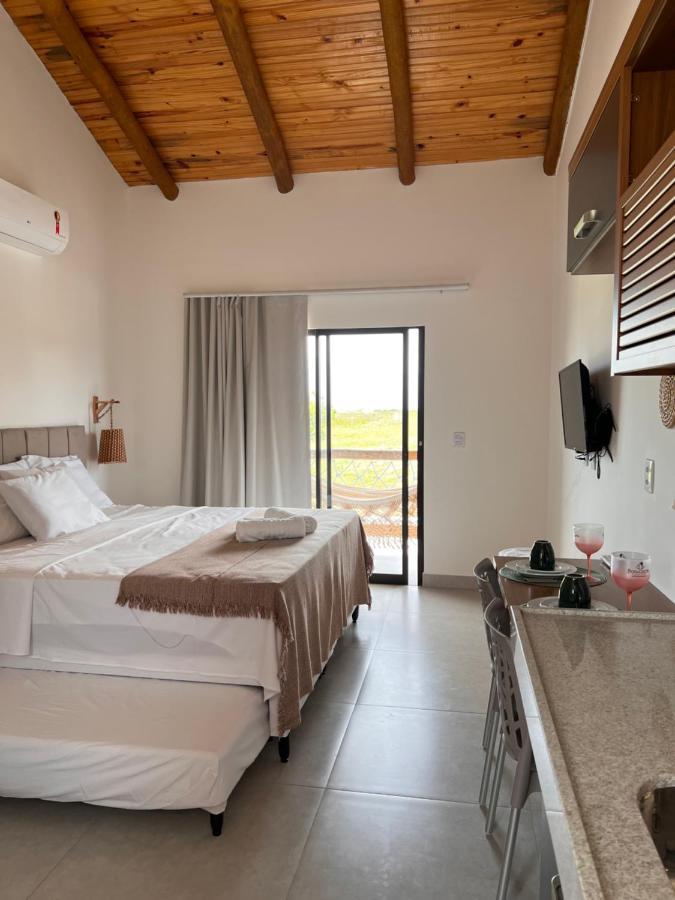 Quarto Quádruplo com Vista do Mar.