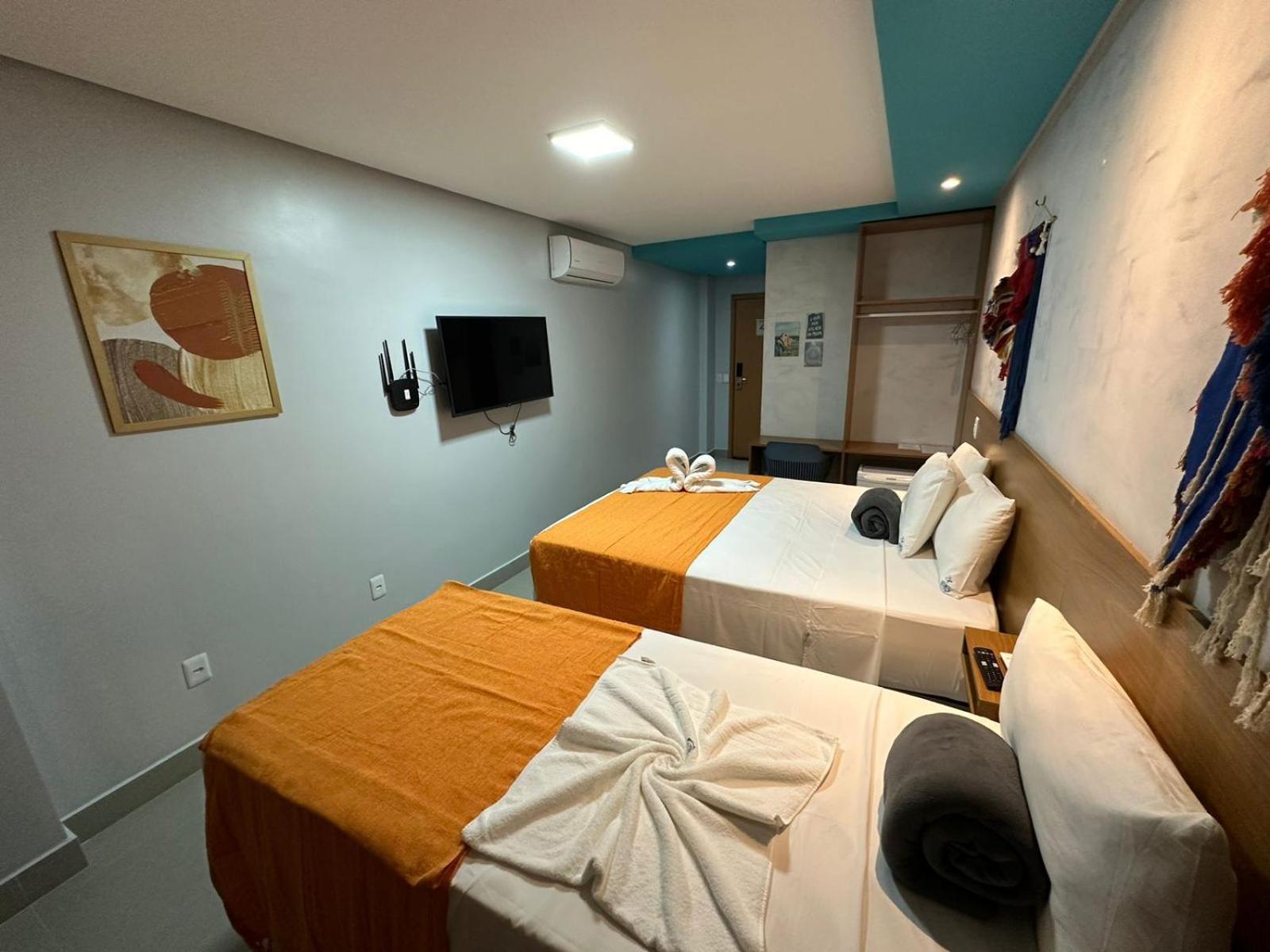Quarto Triplo Deluxe com Vista Mar
