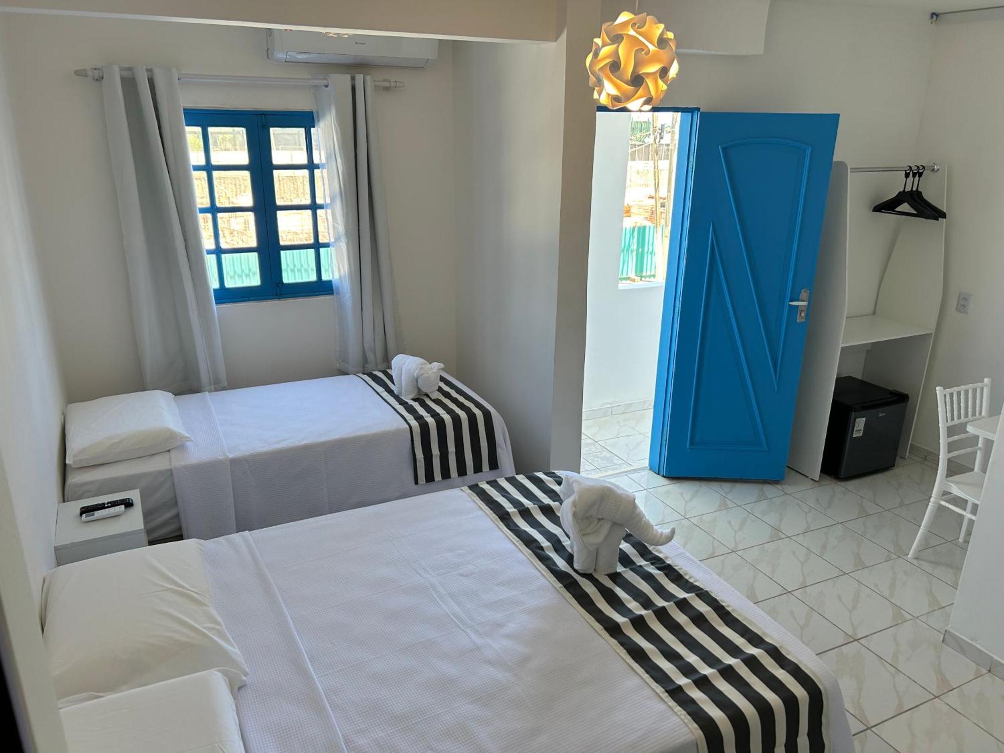 Quarto Triplo com Varanda
