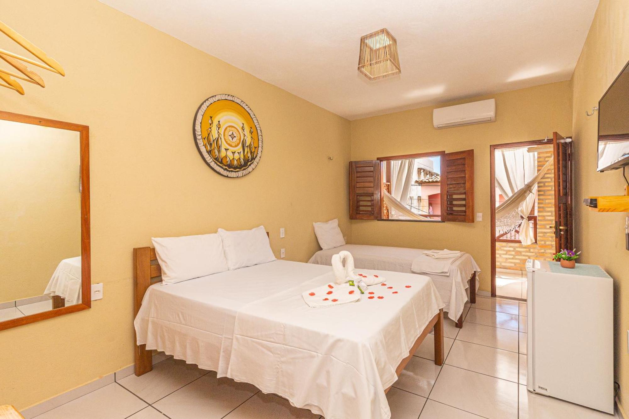 Quarto Triplo com Varanda