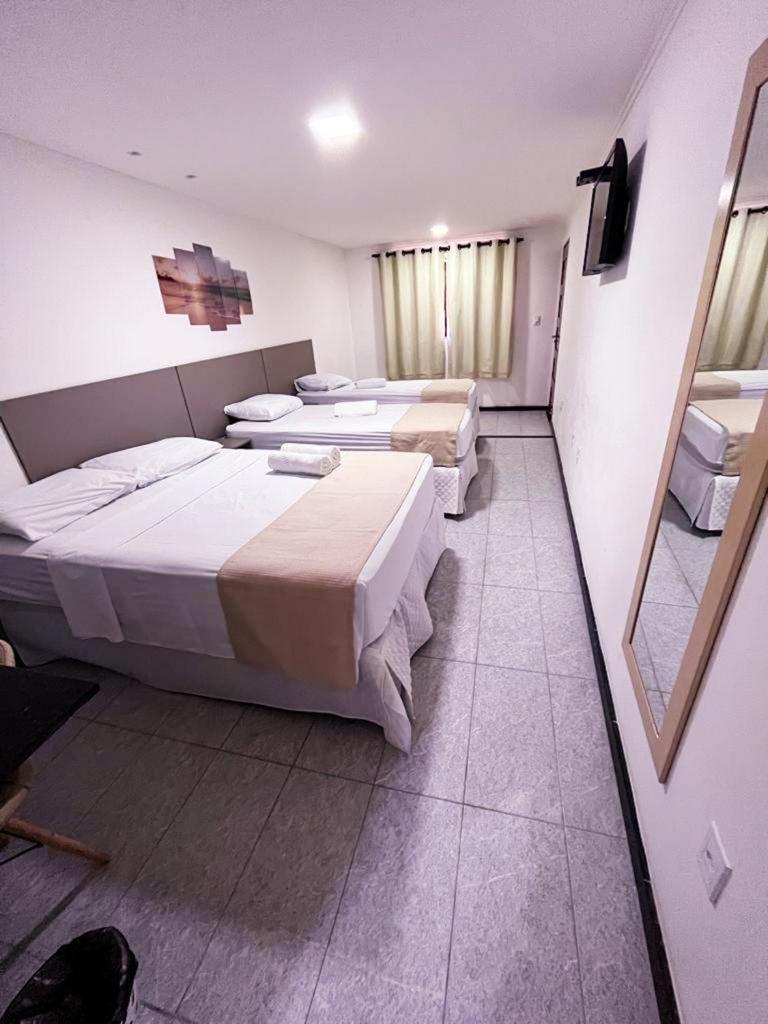 Quarto Quádruplo com Vista do Mar.