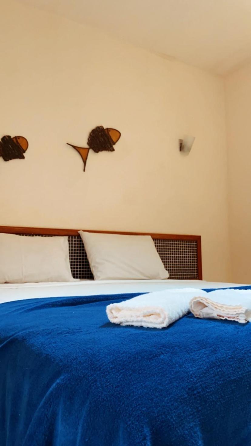 Quarto Triplo com Vista para a Piscina
