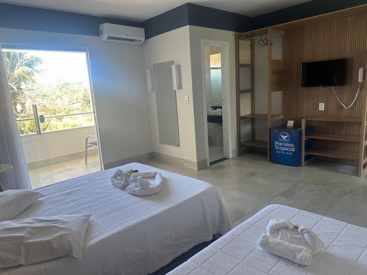 Quarto Triplo Deluxe com Varanda