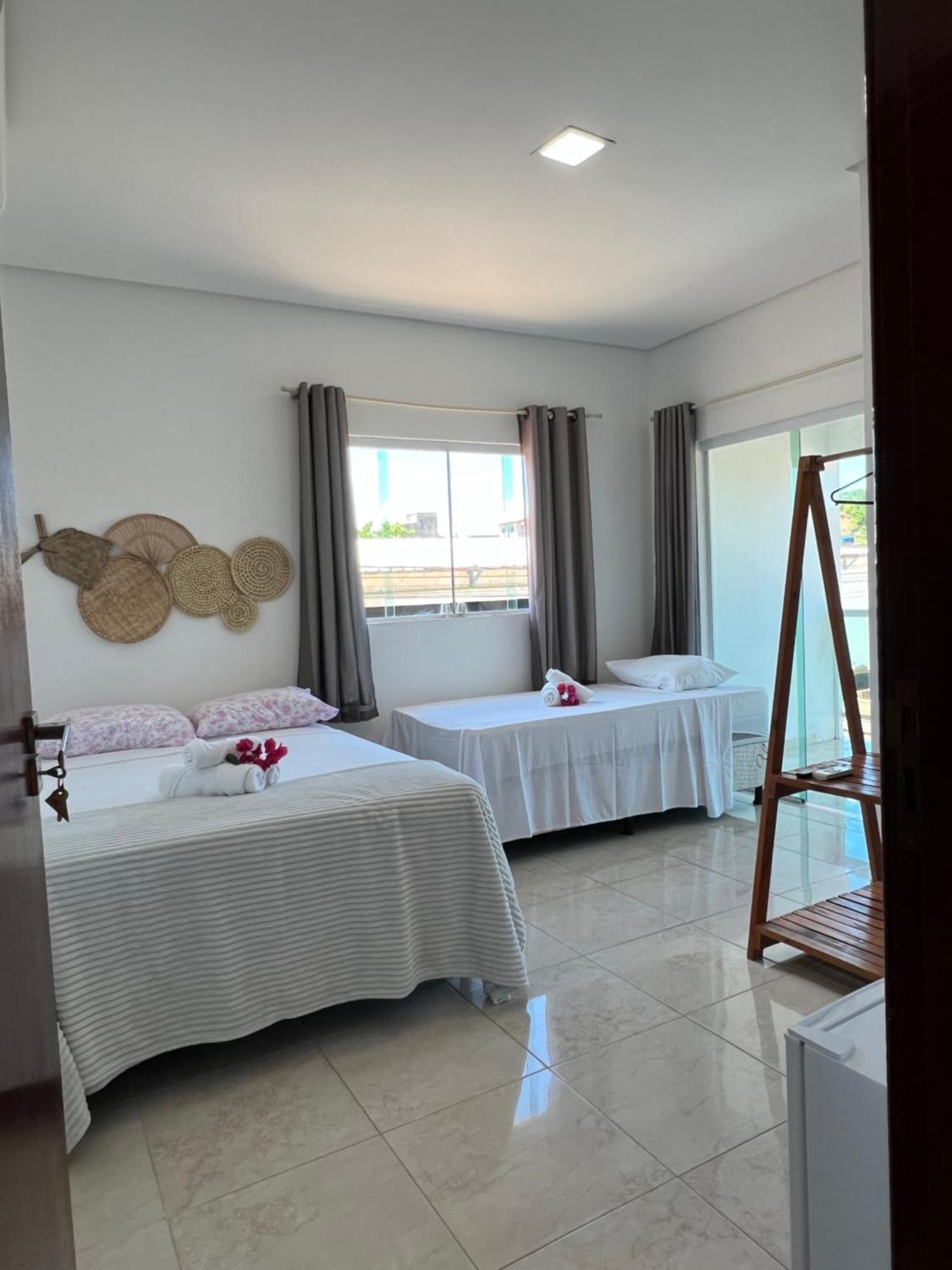 Quarto Triplo com Varanda