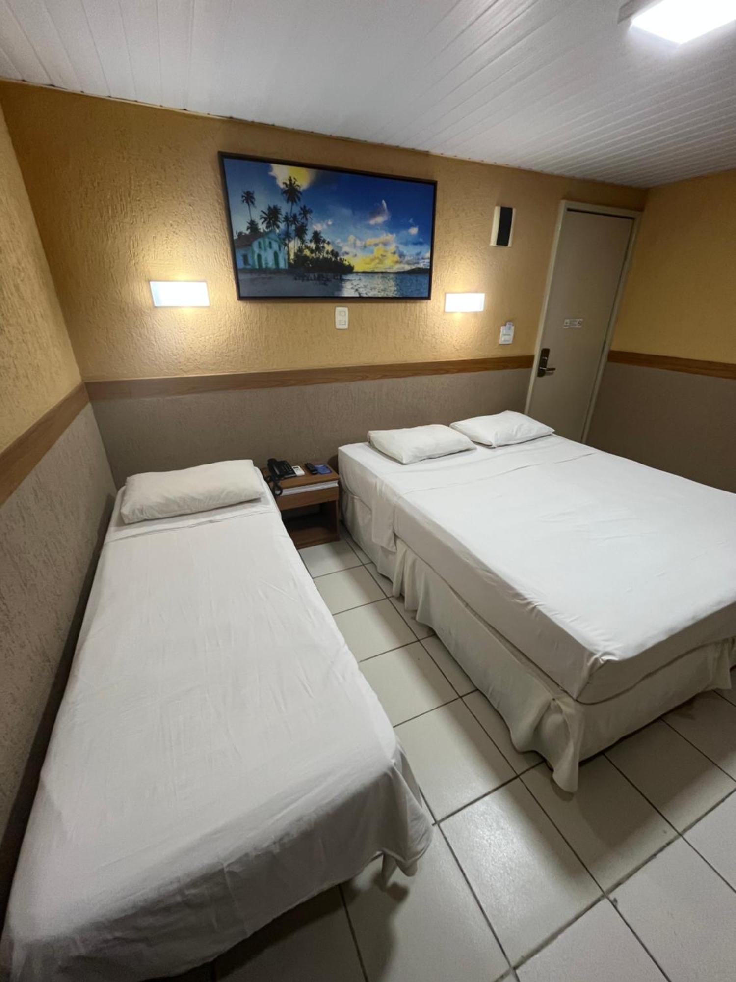 Triple Room (1 Double Bed + 1 Single Bed)