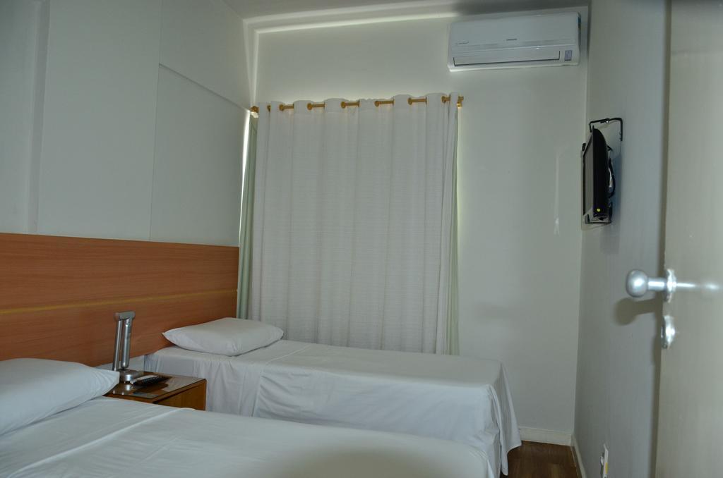 Apartamento Triplo com Varanda