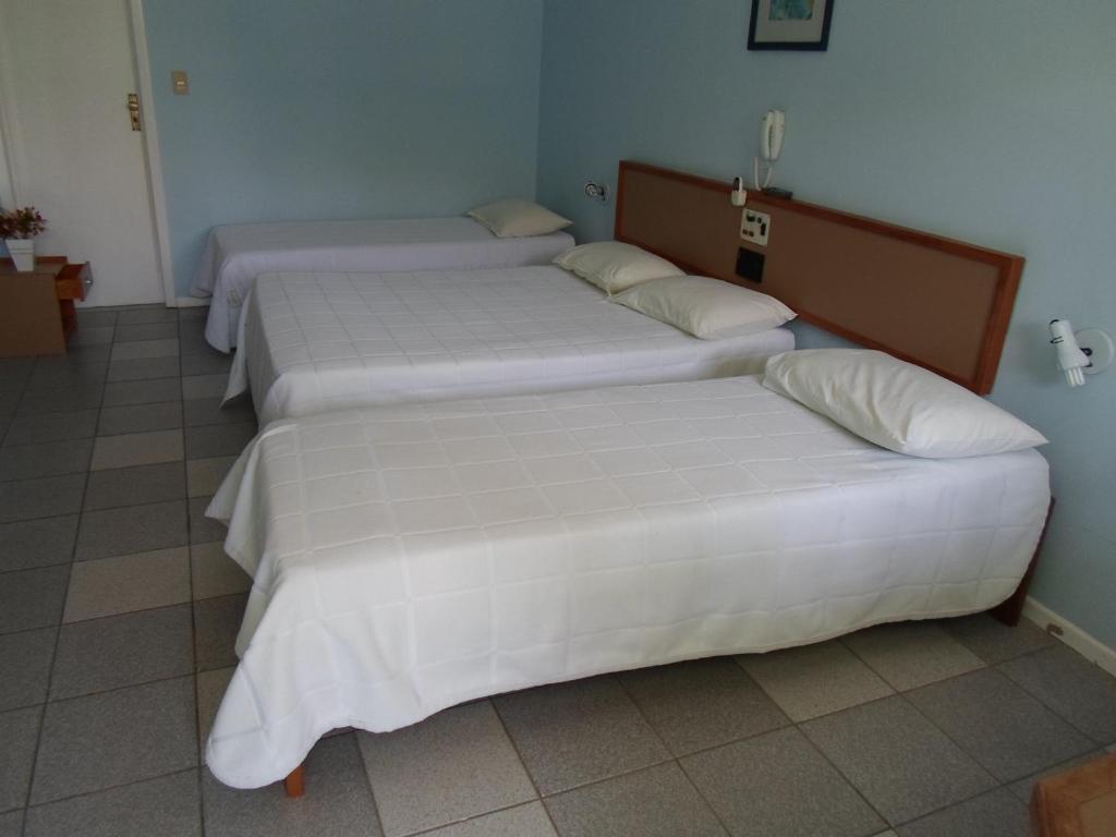 Quarto Quádruplo com Varanda