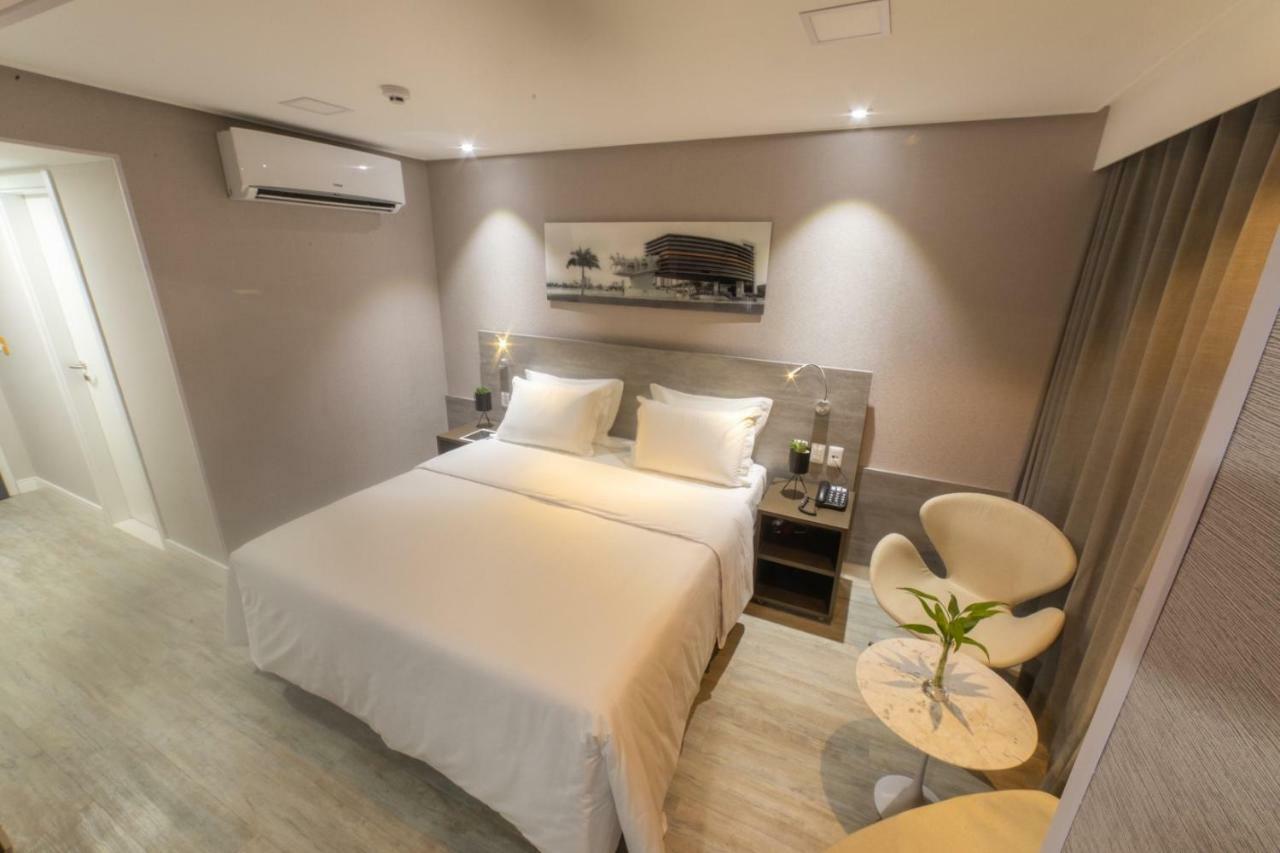 Quarto duplo premium com cama king-size