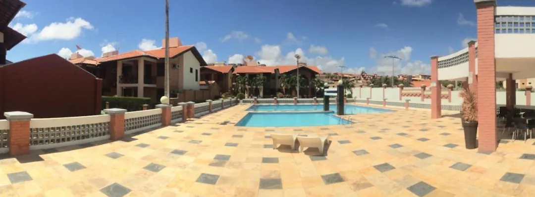 Linda casa Porto das Dunas: 4 suítes, churrasqueira e piscina-1